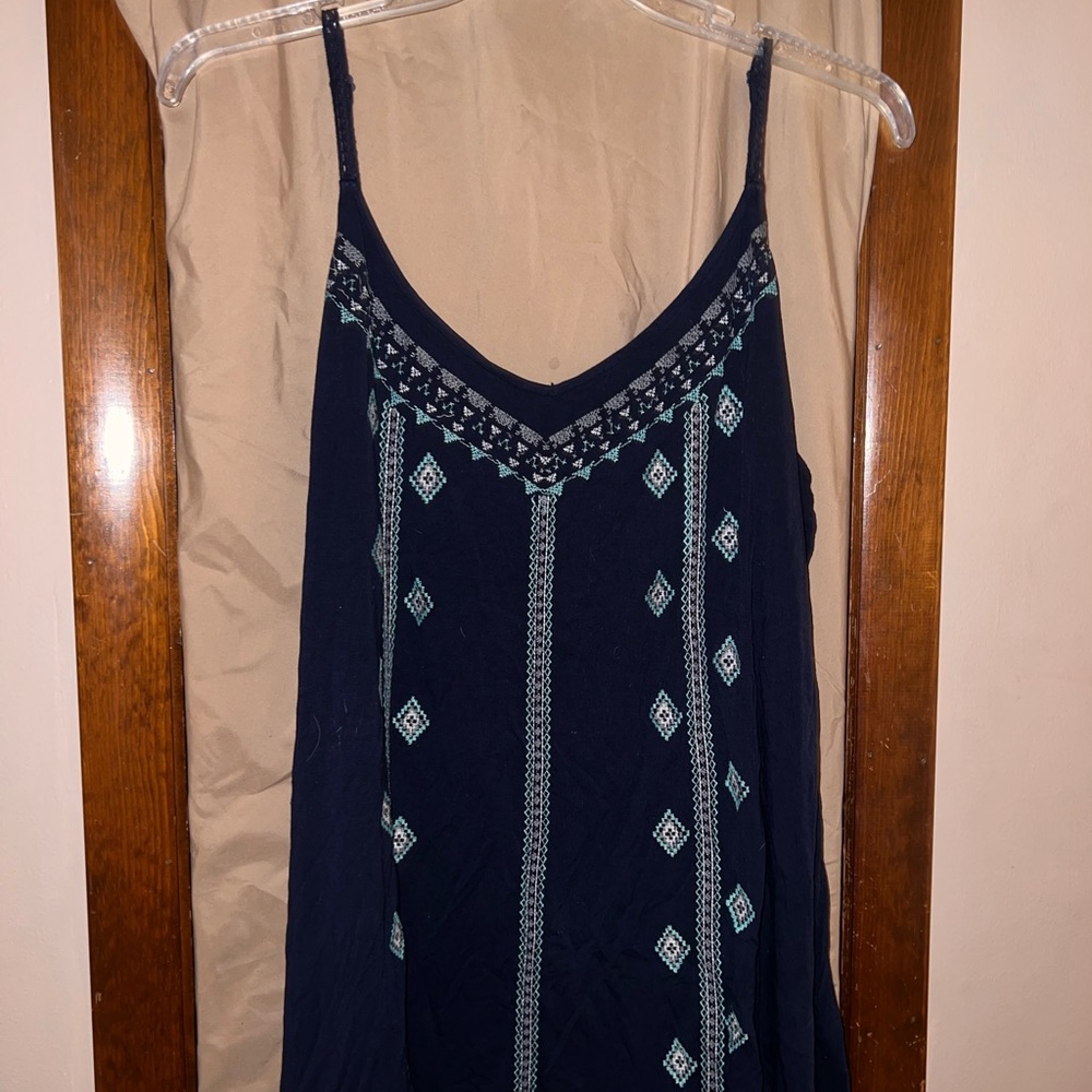 Braided sleeveless tank top. Super Soft Torrid Knits with embroidery.